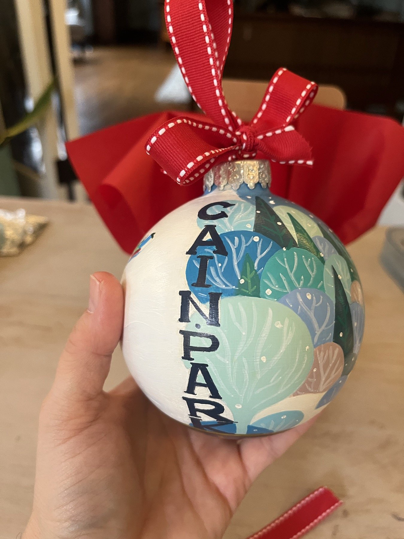 Hand-painted Cleveland Heights ornament showing the place name