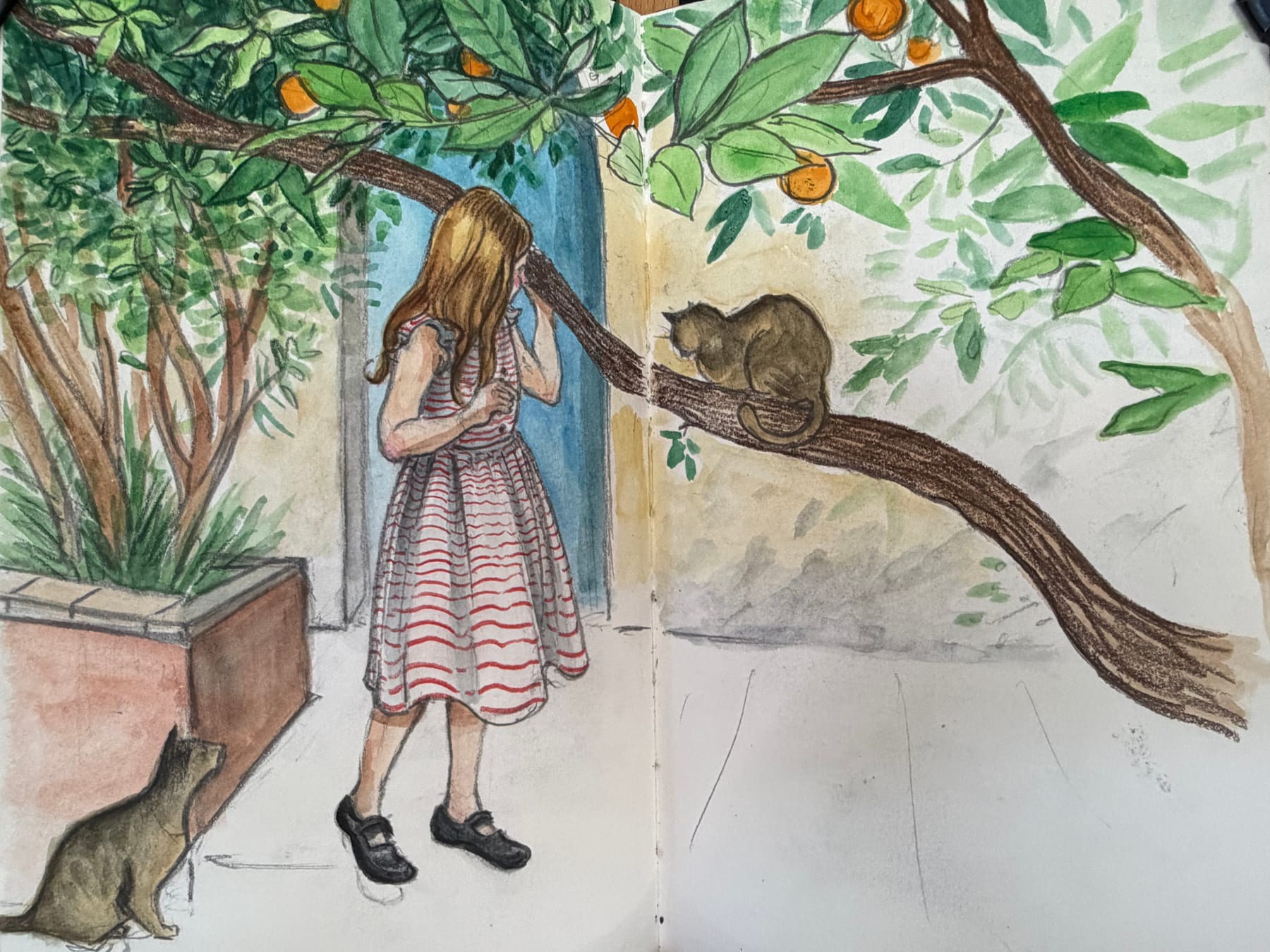 A girl studies a cat resting beneath a fruiting orange tree