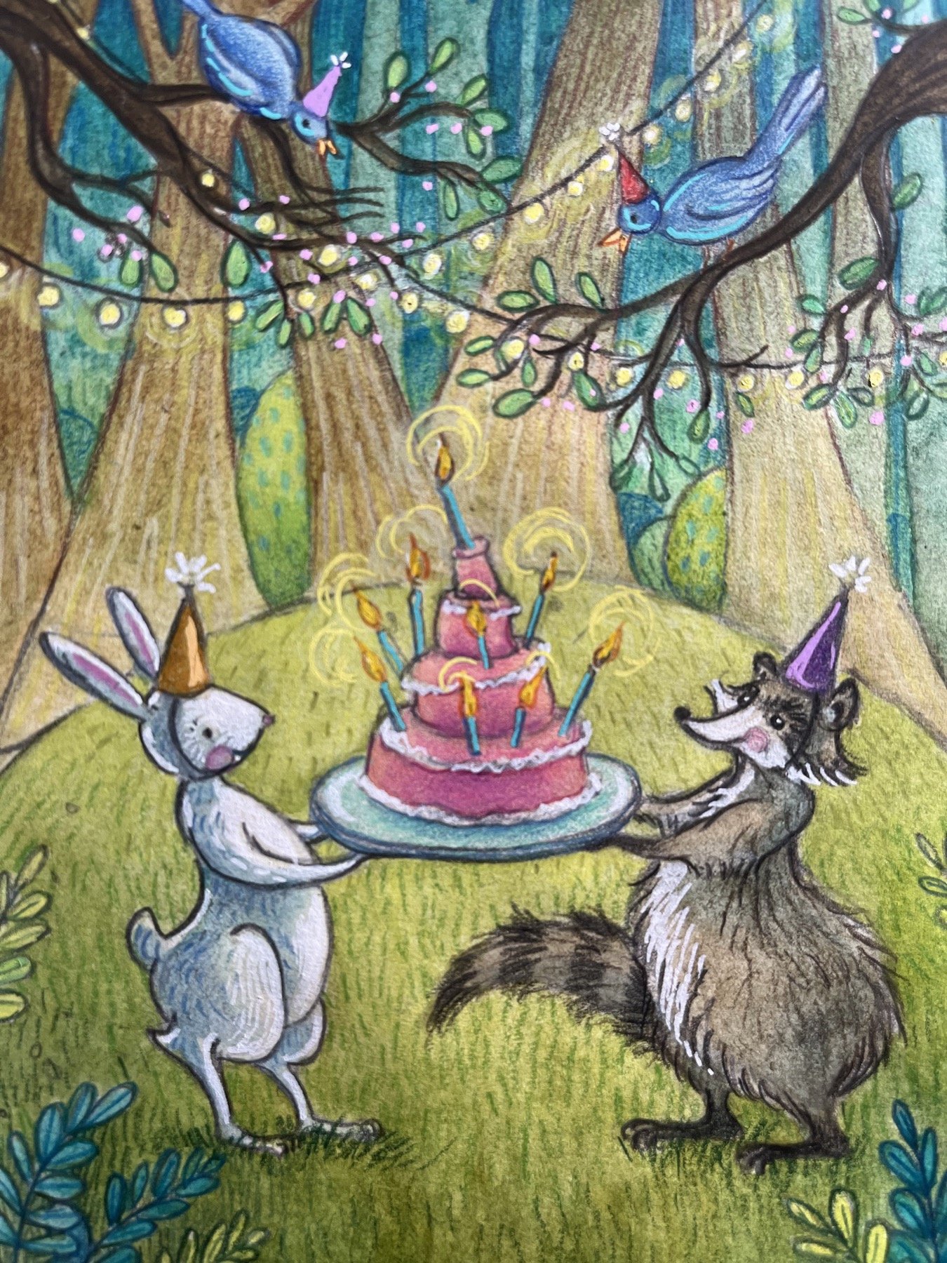 Woodland animals gathered around a candlelit cake beneath a tree